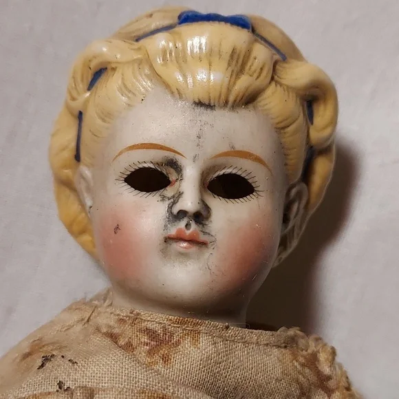 Antique China Head Doll with Blonde Hair & Blue Ribbon in Hair Partial Body